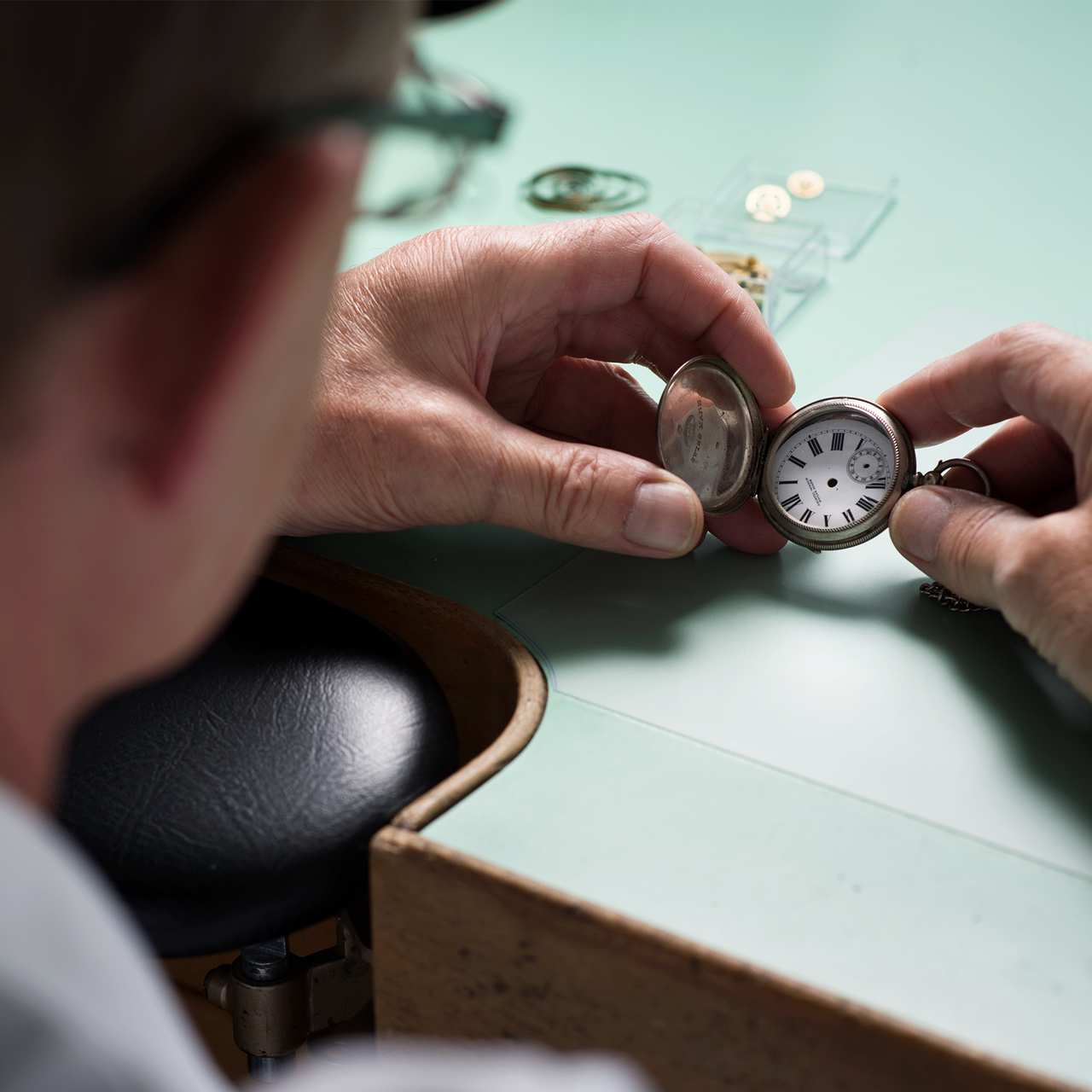 Johnsons Jewellers Watch Specialist Inspecting Pocket Watch
